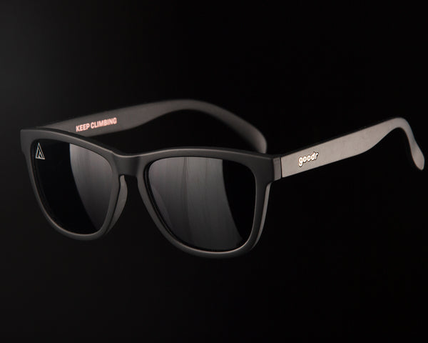 Black Goodr x 29029 sunglasses. Features a tiny 29029 logo on the upper right corner of the left lens and 'Keep Climbing' in red on the inside arm.